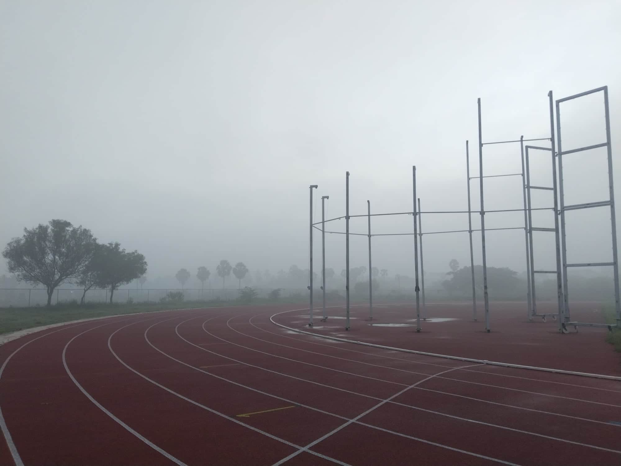 Running track in the mist
